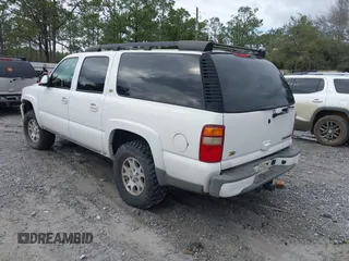 2003 Chevrolet Suburban LT z VIN 3GNFK16Z23G280270, wystawiony jako IAAI lot #41627119 z przebiegiem 246 282 mil mil oraz . Historia ofert i sprzedaży dostępna na DreamBid. Obrazek 3.