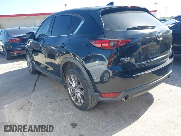 2019 Mazda CX-5 Grand Touring with VIN JM3KFBDM2K0564047, listed as a IAAI auction lot 42000455 with 152,590 mi miles and . Bid and sale history available at carsss.com. Image 3.
