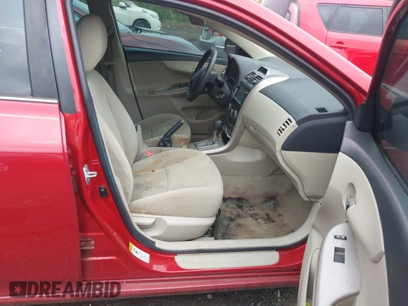 2013 Toyota Corolla L with VIN 5YFBU4EE0DP151229, listed as a IAAI auction lot 42086957 with 184,244 mi miles. Bid and sale history available at carsss.com. Image 5.