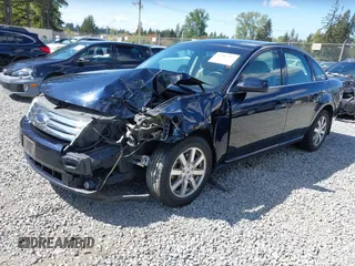 2008 Ford Taurus SEL with VIN 1FAHP24W98G140677, listed as a IAAI auction lot 42087217 with 151,693 mi miles. Bid and sale history available at carsss.com. Image 2.