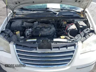 2010 Chrysler Town & Country Limited with VIN 2A4RR7DX1AR357668, listed as a IAAI auction lot 42173545 with 114,486 mi miles and . Bid and sale history available at carsss.com. Image 10.