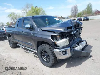 2014 Toyota Tundra Limited with VIN 5TFBW5F17EX353094, listed as a IAAI auction lot 42020155 with 135,597 mi miles and . Bid and sale history available at DreamBid. Image 1.