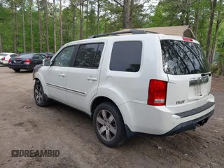 2014 Honda Pilot Touring z VIN 5FNYF4H93EB022045, wystawiony jako IAAI lot #42060815 z przebiegiem Nie podano mil oraz . Historia ofert i sprzedaży dostępna na DreamBid. Obrazek 3.