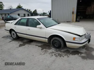 1997 Cadillac Seville Luxury SLS z VIN 1G6KS52Y0VU819998, wystawiony jako Copart lot #55979335 z przebiegiem 87 054 mil mil oraz Szkoda całkowita • Salvage title. Historia ofert i sprzedaży dostępna na DreamBid. Obrazek 4.