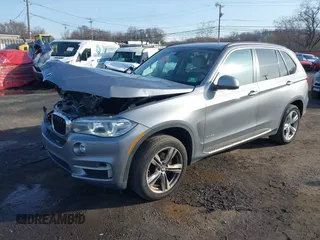 2014 BMW X5 xDrive35i z VIN 5UXKR0C52E0H19670, wystawiony jako IAAI lot #41909590 z przebiegiem 137 758 mil mil oraz . Historia ofert i sprzedaży dostępna na DreamBid. Obrazek 2.