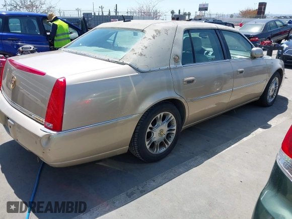 2006 Cadillac DTS w/1SC with VIN 1G6KD57Y26U112518, listed as a IAAI auction lot 42100747 with 122,149 mi miles. Bid and sale history available at carsss.com. Image 4.