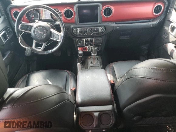2021 Jeep Gladiator Rubicon with VIN 1C6JJTBG3ML602478, listed as a Copart auction lot 58138705 with 76,759 mi miles and Salvage title. Bid and sale history available at DreamBid. Image 8.