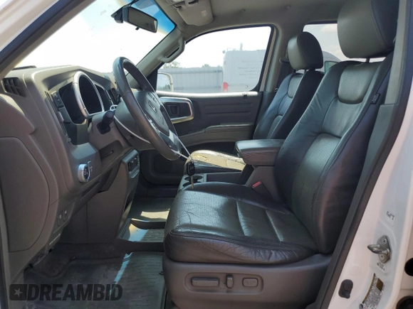 2006 Honda Ridgeline RTL with VIN 2HJYK16586H515981, listed as a Copart auction lot 63221305 with 137,763 mi miles and Clean title. Bid and sale history available at DreamBid. Image 7.
