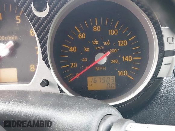2003 Nissan 350Z Touring z VIN JN1AZ34E33T003711, wystawiony jako IAAI lot #41351191 z przebiegiem 167 503 mil mil oraz . Historia ofert i sprzedaży dostępna na DreamBid. Obrazek 15.