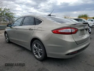 2015 Ford Fusion Titanium Hybrid with VIN 3FA6P0RUXFR115229, listed as a Copart auction lot 54629355 with 76,671 mi miles and Salvage title. Bid and sale history available at DreamBid. Image 2.