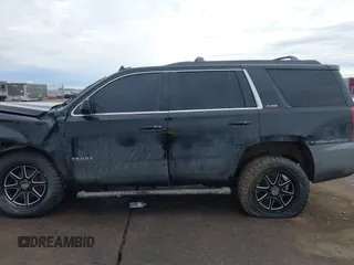 2017 Chevrolet Tahoe LT with VIN 1GNSKBKC7HR178685, listed as a IAAI auction lot 41466840 with 163,610 mi miles and . Bid and sale history available at DreamBid. Image 14.