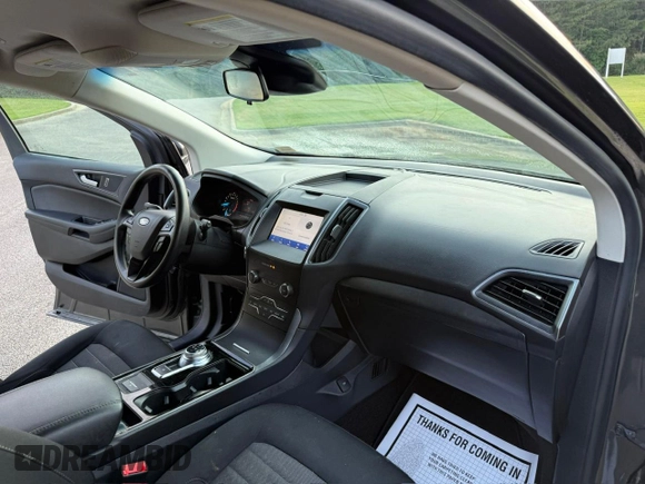 2020 Ford Edge SE с VIN 2FMPK3G9XLBB11099, выставлен на аукционе Copart как лот 66417805 с пробегом 119 223 миль миль и Чистый • Clean title. История ставок и продаж доступна на DreamBid. Изображение 9.
