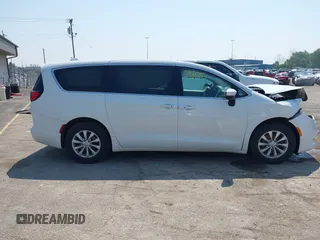 2017 Chrysler Pacifica Touring with VIN 2C4RC1DG4HR533711, listed as a IAAI auction lot 42434805 with 141,859 mi miles and . Bid and sale history available at DreamBid. Image 13.
