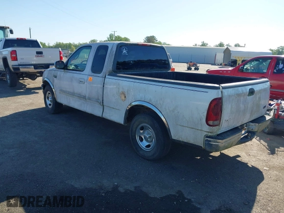 2002 Ford F-150 XL with VIN 1FTRX17272NA51467, listed as a IAAI auction lot 42095907 with 1 mi miles. Bid and sale history available at carsss.com. Image 3.