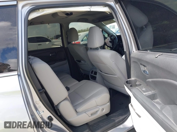 2021 Honda Pilot Touring 8-Passenger with VIN 5FNYF5H99MB041638, listed as a IAAI auction lot 42112915 with 33,230 mi miles and . Bid and sale history available at DreamBid. Image 8.