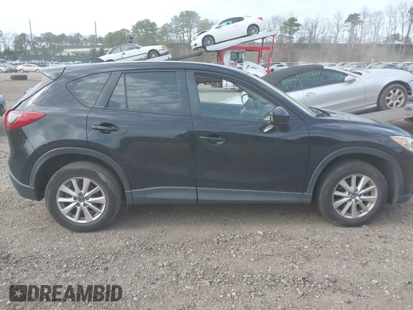 2014 Mazda CX-5 Sport with VIN JM3KE4BE4E0426931, listed as a IAAI auction lot 42055582 with 121,418 mi miles. Bid and sale history available at carsss.com. Image 13.