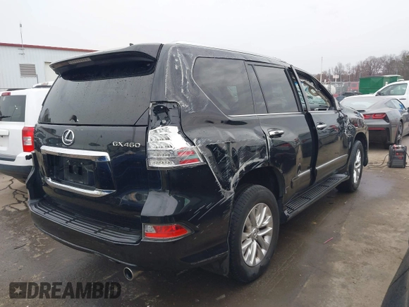2014 Lexus GX 460 with VIN JTJBM7FX6E5073973, listed as a IAAI auction lot 41610332 with 128,870 mi miles. Bid and sale history available at carsss.com. Image 17.