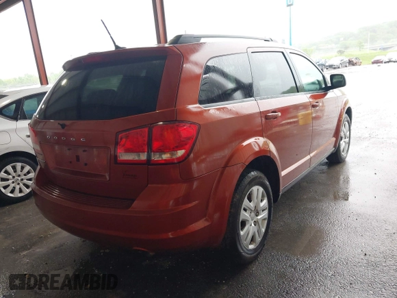 2014 Dodge Journey SE with VIN 3C4PDCAB1ET227003, listed as a IAAI auction lot 42143105 with 212,334 mi miles. Bid and sale history available at carsss.com. Image 4.