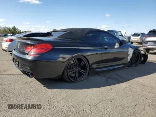 2013 BMW M6 z VIN WBSLZ9C56DDZ77892, wystawiony jako Copart lot #52102785 z przebiegiem 94 380 mil mil oraz Szkoda całkowita • Salvage title. Historia ofert i sprzedaży dostępna na DreamBid. Obrazek 3.