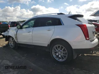 2014 Cadillac SRX Premium Collection z VIN 3GYFNGE31ES615593, wystawiony jako Copart lot #56785775 z przebiegiem 247 230 mil mil oraz Tytuł czysty. Historia ofert i sprzedaży dostępna na DreamBid. Obrazek 2.