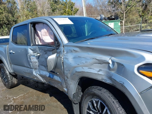 2023 Toyota Tacoma 4WD SR with VIN 3TYCZ5AN7PT122067, listed as a IAAI auction lot 41624047 with 27,483 mi miles. Bid and sale history available at carsss.com. Image 6.