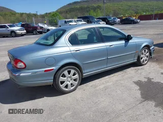 2004 Jaguar X-Type with VIN SAJEA51C64WD99643, listed as a IAAI auction lot 42086360 with 134,126 mi miles and . Bid and sale history available at DreamBid. Image 4.