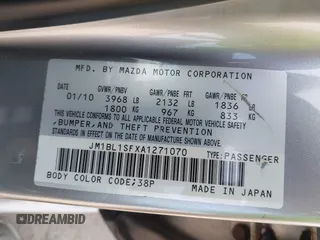 2010 Mazda 3 i Sport with VIN JM1BL1SFXA1271070, listed as a IAAI auction lot 42148364 with 123,921 mi miles and . Bid and sale history available at DreamBid. Image 9.