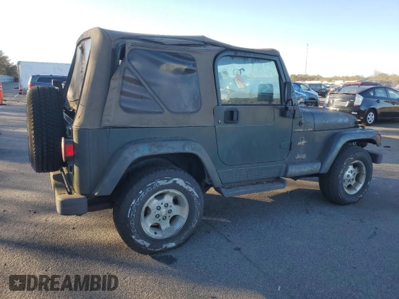 2002 Jeep Wrangler Sahara with VIN 1J4FA59S12P757177, listed as a Copart auction lot 42808925 with 71,049 mi miles and Clean title. Bid and sale history available at DreamBid. Image 3.