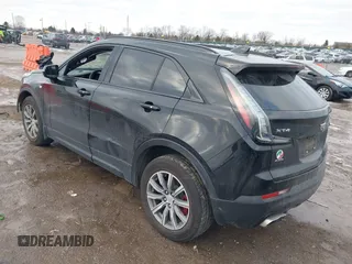 2021 Cadillac XT4 AWD Sport with VIN 1GYFZFR49MF065225, listed as a IAAI auction lot 41191994 with 58,095 mi miles and . Bid and sale history available at DreamBid. Image 3.