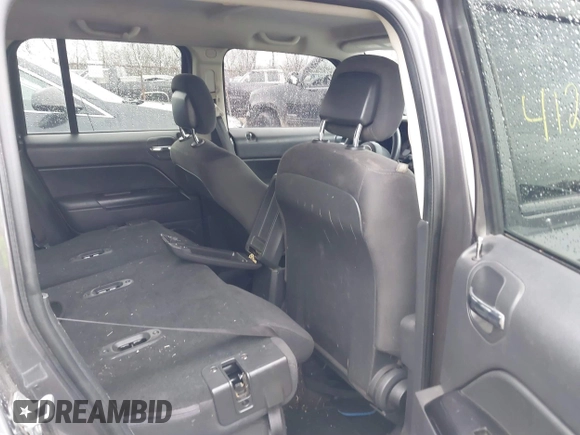 2015 Jeep Patriot Altitude Edition with VIN 1C4NJPBA6FD250698, listed as a IAAI auction lot 41204295 with 224,413 mi miles. Bid and sale history available at carsss.com. Image 8.