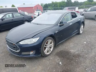 2014 Tesla Model S 60 with VIN 5YJSA1H19EFP32063, listed as a IAAI auction lot 42360872 with 103,495 mi miles and . Bid and sale history available at DreamBid. Image 19.