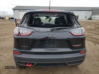 2019 Jeep Cherokee Trailhawk with VIN 1C4PJMBX7KD341534, listed as a Copart auction lot 52352765 with 207,532 mi miles and Salvage Title. Bid and sale history available at DreamBid. Image 6.
