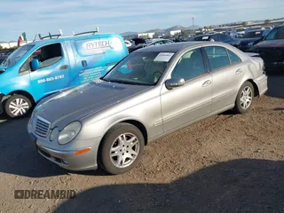 2005 Mercedes-Benz E-Class 3.2L with VIN WDBUF65J05A646577, listed as a IAAI auction lot 41666861 with 106,012 mi miles. Bid and sale history available at carsss.com. Image 17.