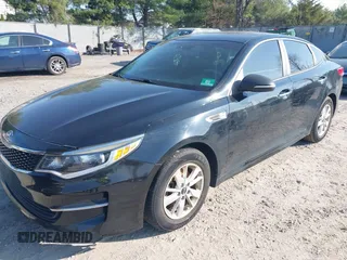 2016 Kia Optima LX with VIN 5XXGT4L36GG105637, listed as a IAAI auction lot 42013800 with 111,836 mi miles. Bid and sale history available at carsss.com. Image 16.