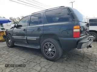 2003 Chevrolet Tahoe LT with VIN 1GNEC13TX3R293907, listed as a Copart auction lot 71849144 with 238,669 mi miles and Salvage Title. Bid and sale history available at carsss.com. Image 2.
