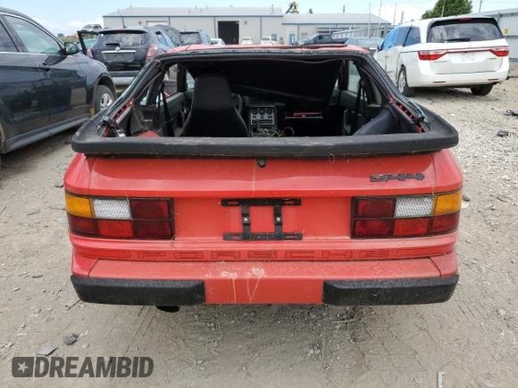 1984 Porsche 944 z VIN WP0AA0945EN454696, wystawiony jako Copart lot #61697004 z przebiegiem 66 607 mil mil oraz Czysty tytuł • Clean title. Historia ofert i sprzedaży dostępna na DreamBid. Obrazek 6.
