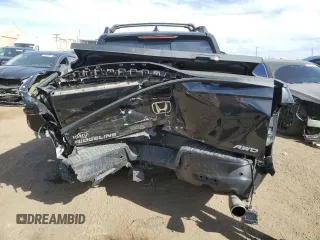 2023 Honda Ridgeline RTL-E with VIN 5FPYK3F71PB024149, listed as a Copart auction lot 50767465 with 40,943 mi miles and Salvage title. Bid and sale history available at DreamBid. Image 6.
