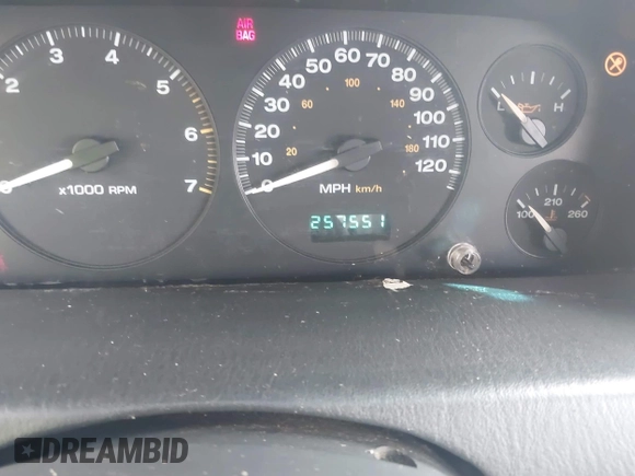 2003 Jeep Grand Cherokee Laredo z VIN 1J4GW48S33C599693, wystawiony jako IAAI lot #42228885 z przebiegiem 257 551 mil mil oraz . Historia ofert i sprzedaży dostępna na DreamBid. Obrazek 7.