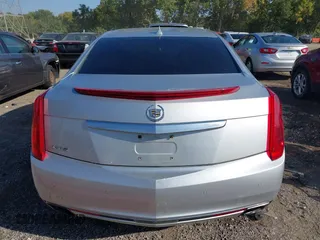 2013 Cadillac XTS Premium z VIN 2G61S5S30D9184910, wystawiony jako IAAI lot #40220419 z przebiegiem 111 330 mil mil oraz . Historia ofert i sprzedaży dostępna na DreamBid. Obrazek 16.