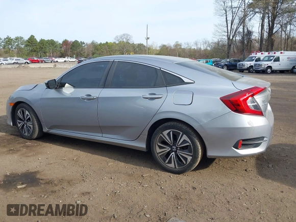 2018 Honda Civic Sedan LX with VIN 2HGFC2F5XJH573938, listed as a IAAI auction lot 42098109 with 69,037 mi miles. Bid and sale history available at carsss.com. Image 14.