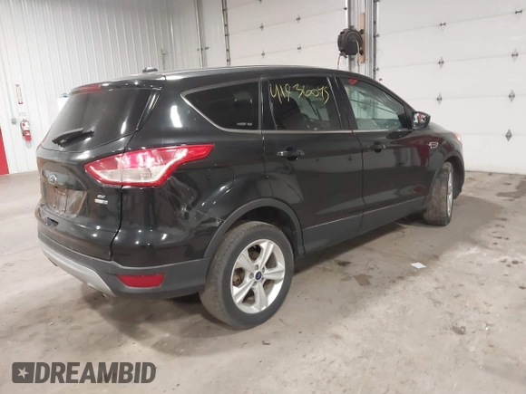 2015 Ford Escape SE with VIN 1FMCU9GX8FUB42666, listed as a IAAI auction lot 41936045 with 178,194 mi miles and . Bid and sale history available at DreamBid. Image 4.