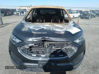 2020 Ford Edge SE z VIN 2FMPK3G92LBB18032, wystawiony jako IAAI lot #38222784 z przebiegiem Nie podano mil oraz . Historia ofert i sprzedaży dostępna na DreamBid. Obrazek 6.