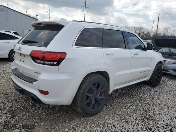 2015 Jeep Grand Cherokee SRT with VIN 1C4RJFDJ3FC918942, listed as a Copart auction lot 52078175 with 115,964 mi miles and Salvage Title. Bid and sale history available at carsss.com. Image 3.