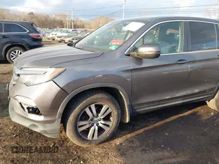 2016 Honda Pilot EX-L with VIN 5FNYF6H75GB053780, listed as a IAAI auction lot 41340590 with 203,190 mi miles. Bid and sale history available at carsss.com. Image 18.