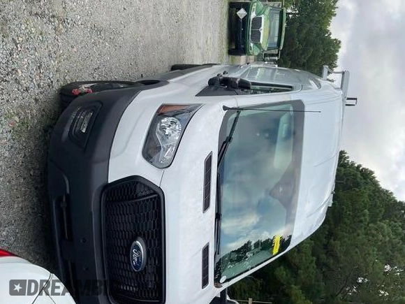 2023 Ford Transit Cargo with VIN 1FTBR1X81PKA75434, listed as a IAAI auction lot 42742887 with 5,111 mi miles and . Bid and sale history available at DreamBid. Image 3.