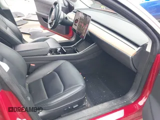 2018 Tesla Model 3 Long Range Battery with VIN 5YJ3E1EB3JF129772, listed as a IAAI auction lot 42017305 with 103,825 mi miles and . Bid and sale history available at DreamBid. Image 5.