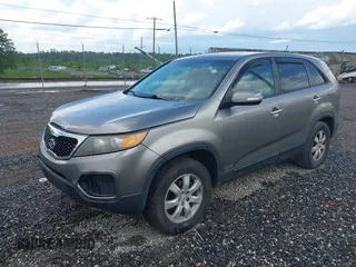 2011 Kia Sorento LX with VIN 5XYKTCA17BG023751, listed as a IAAI auction lot 42176584 with 173,072 mi miles and . Bid and sale history available at DreamBid. Image 2.