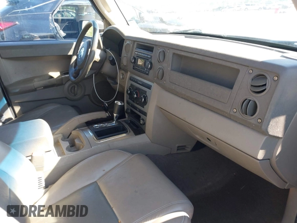 2007 Jeep Commander Sport z VIN 1J8HG48K07C559271, wystawiony jako IAAI lot #42032853 z przebiegiem 236 443 mil mil oraz . Historia ofert i sprzedaży dostępna na DreamBid. Obrazek 5.