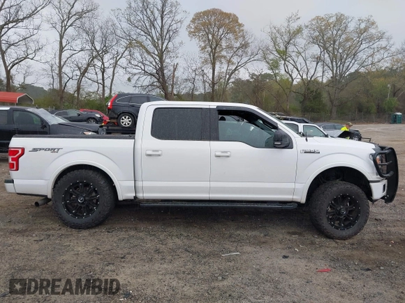 2020 Ford F-150 XL with VIN 1FTEW1EP6LKF44172, listed as a IAAI auction lot 41912854 with 101,278 mi miles and . Bid and sale history available at carsss.com. Image 14.