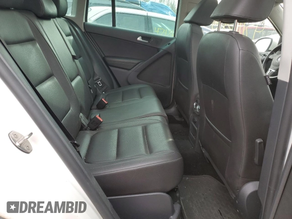 2013 Volkswagen Tiguan SEL with VIN WVGBV3AX2DW058147, listed as a Copart auction lot 47110285 with 156,145 mi miles and Salvage Title. Bid and sale history available at DreamBid. Image 11.